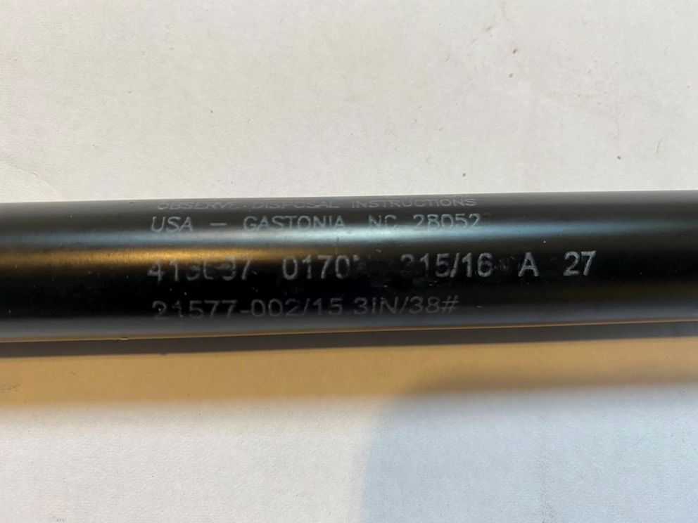 21577